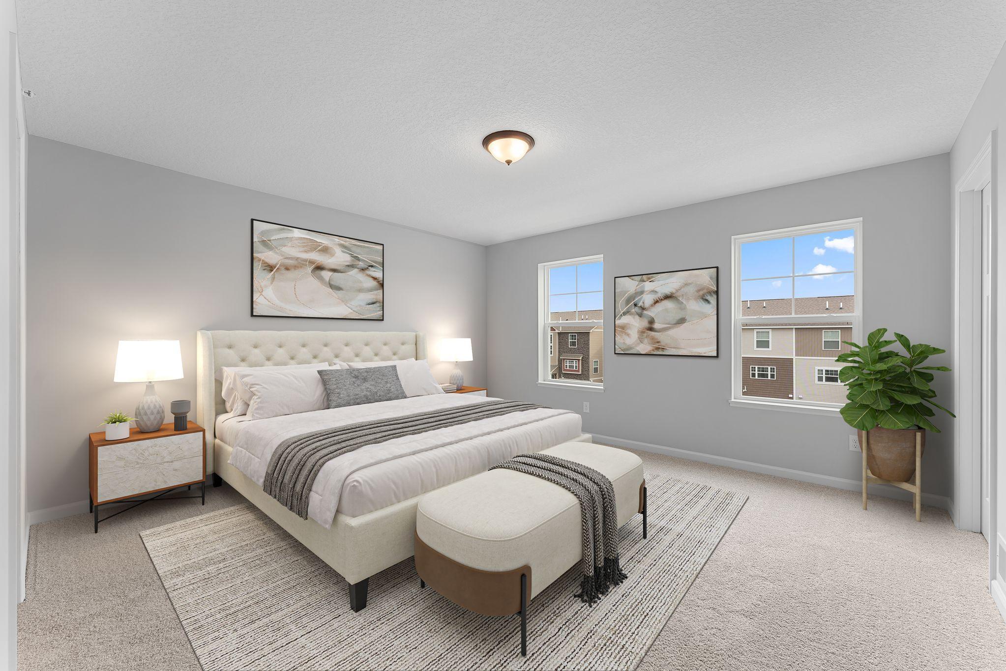 The owner's suite is a true oasis. The en-suite bath provides convenience and luxury and the 17x14 space can easily accommodate many furniture arrangements. Similar home shown, options can vary.