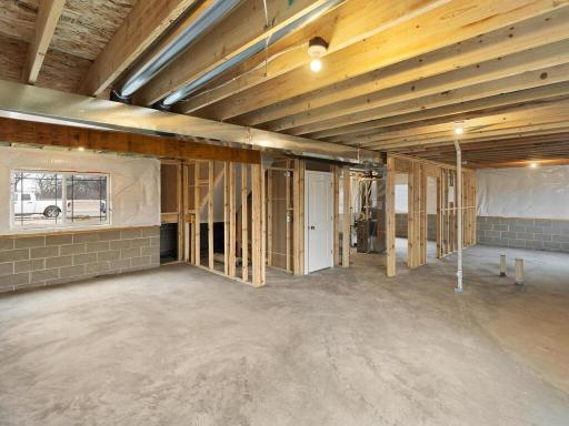 Photo taken of another home with similar plan and finishes. Photos and renderings may not depict actual plan, materials, & finishes may vary. All measurements are approximate.