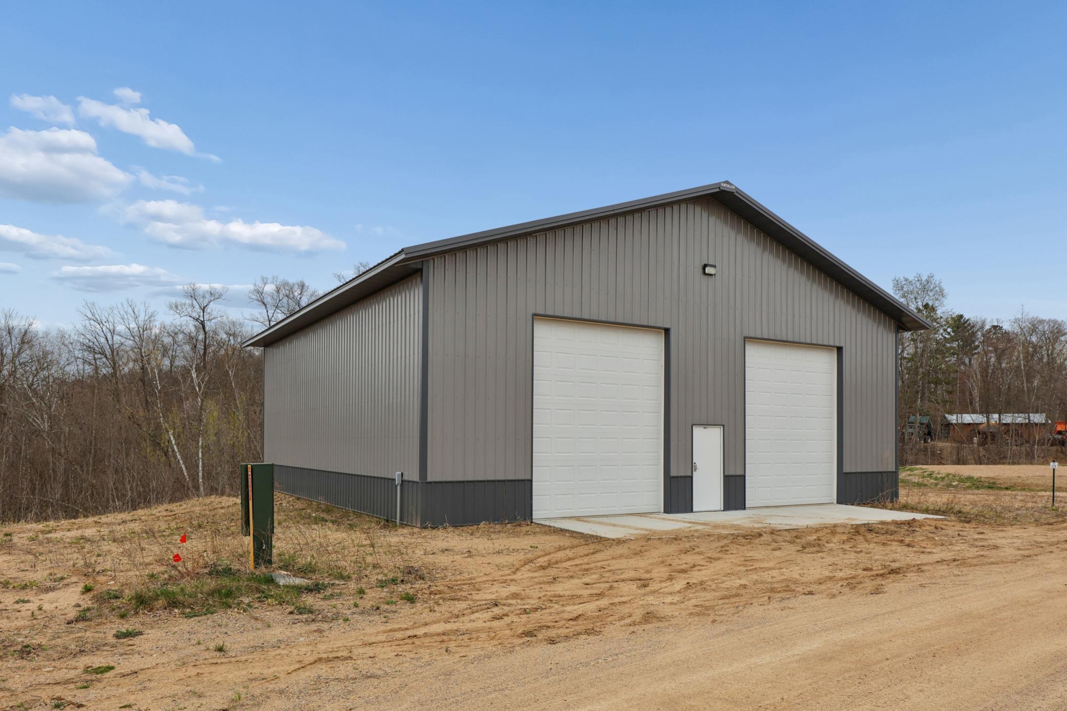 Multiple sites are available. Photo shown is the finished pole building located on Lot 5.