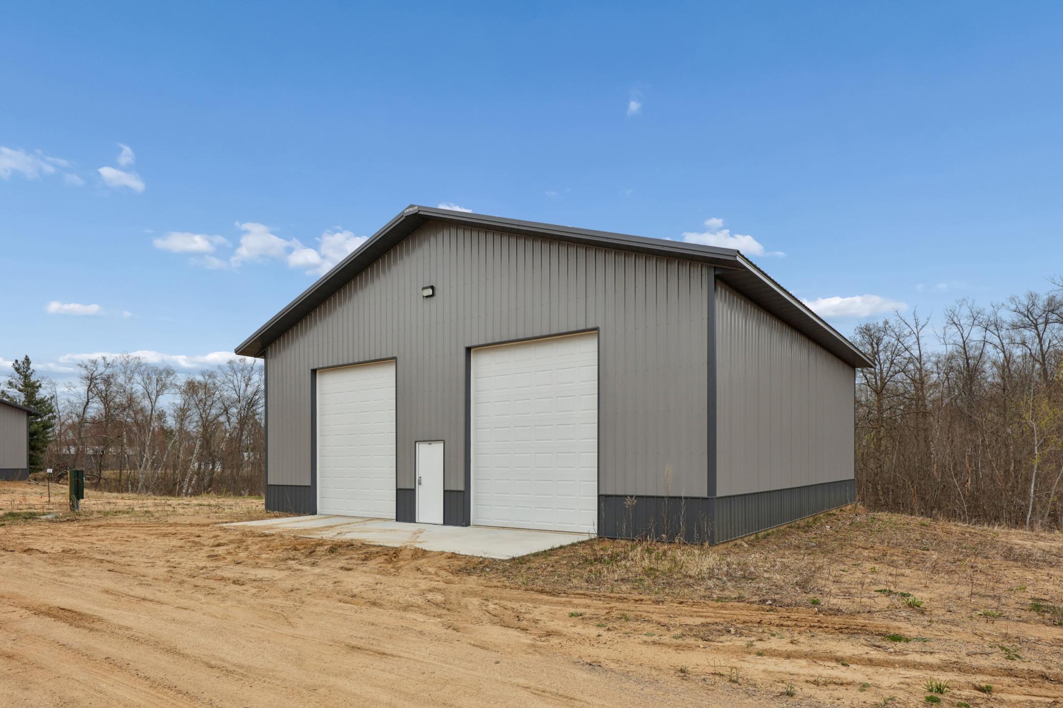 Multiple sites are available. Photo shown is the finished pole building located on Lot 5.