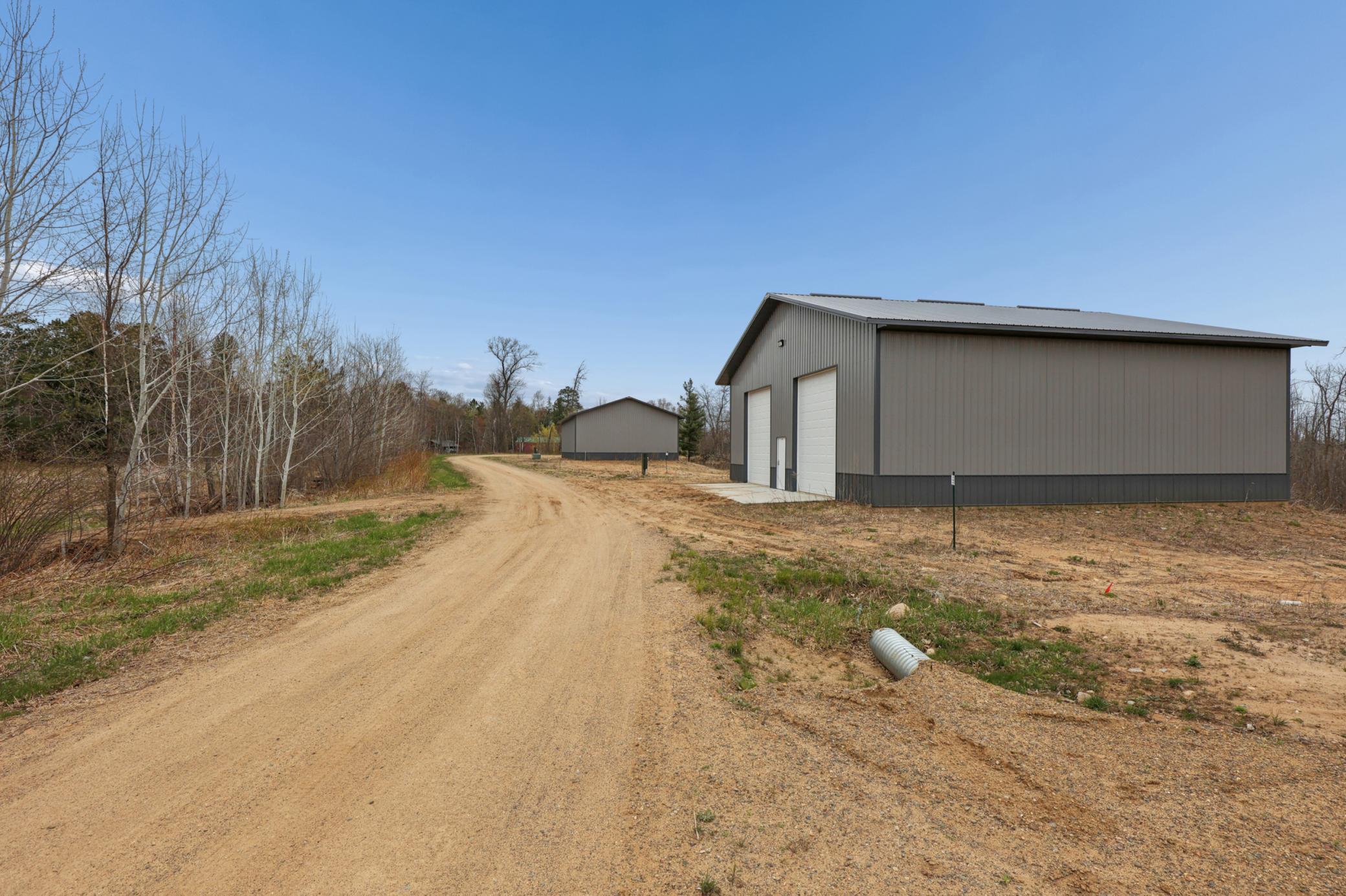 Multiple sites are available. Photo shown is the finished pole building located on Lot 5.