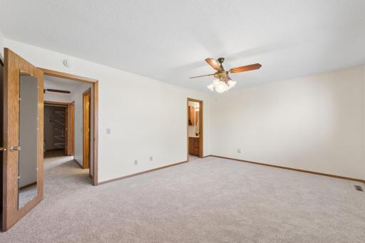 New carpet & paint throughout (2026), spacious owner suite (19x.12.3), double closets for added storage, private 3/4 bath.