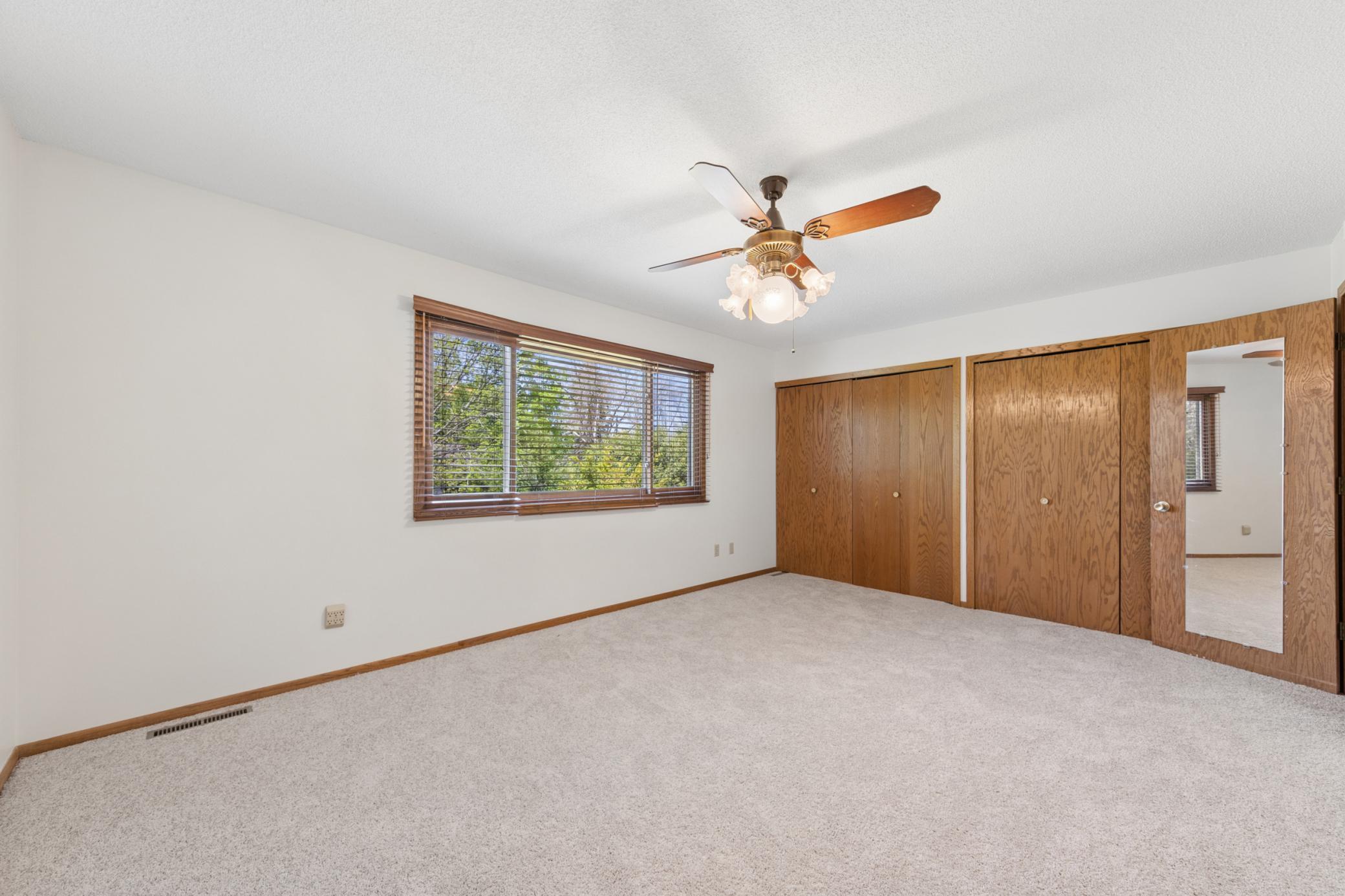 New carpet & paint throughout (2026), spacious owner suite (19x.12.3), double closets for added storage, private 3/4 bath.