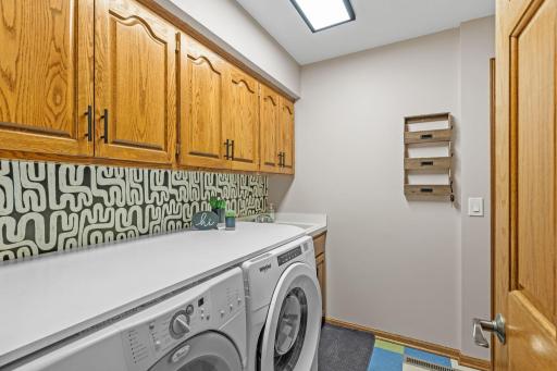 Laundry Room w/ Access to Your Heated & Insulated 3 Car Garage