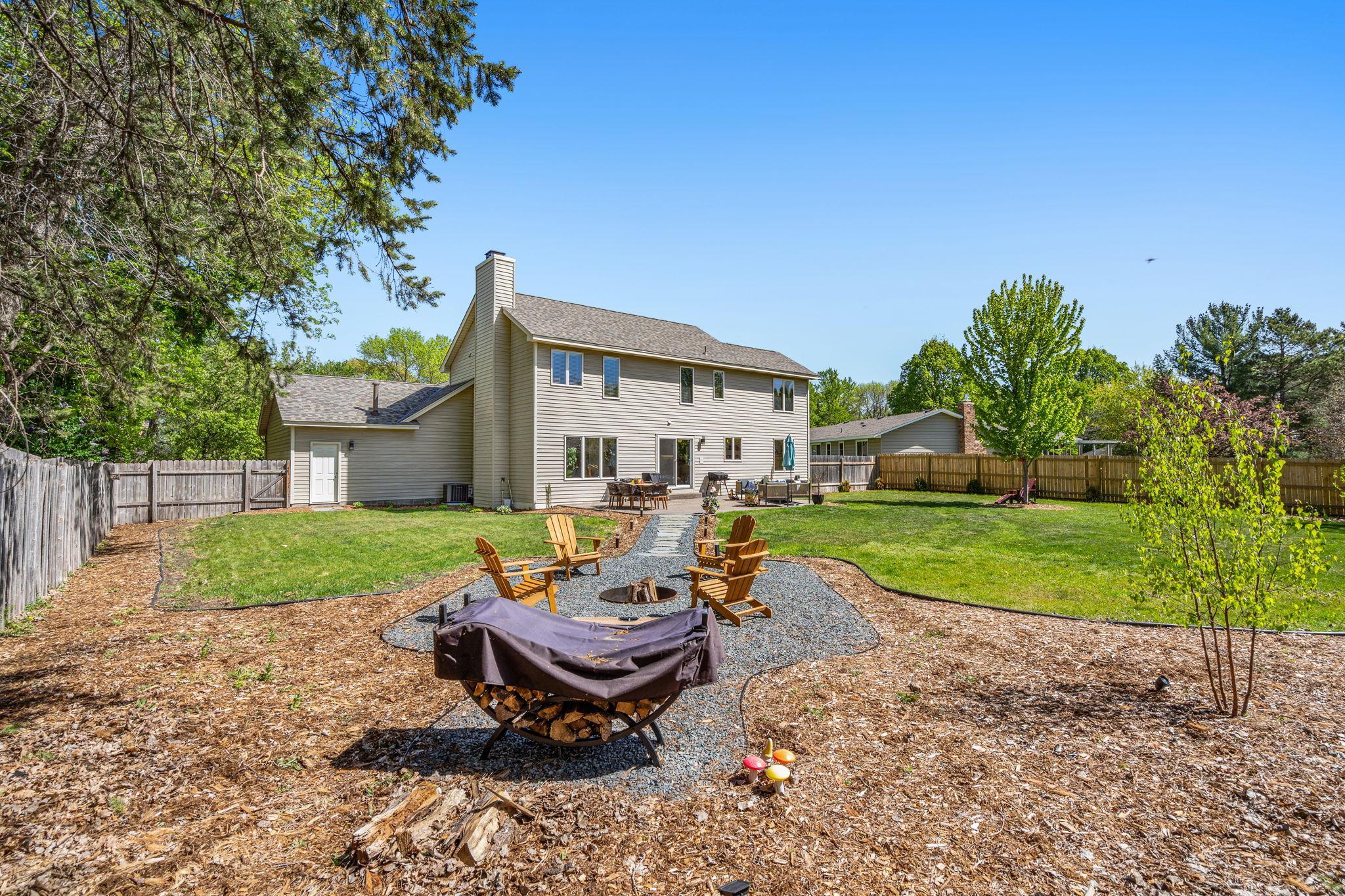 Newly Landscaped Backyard with Firepit