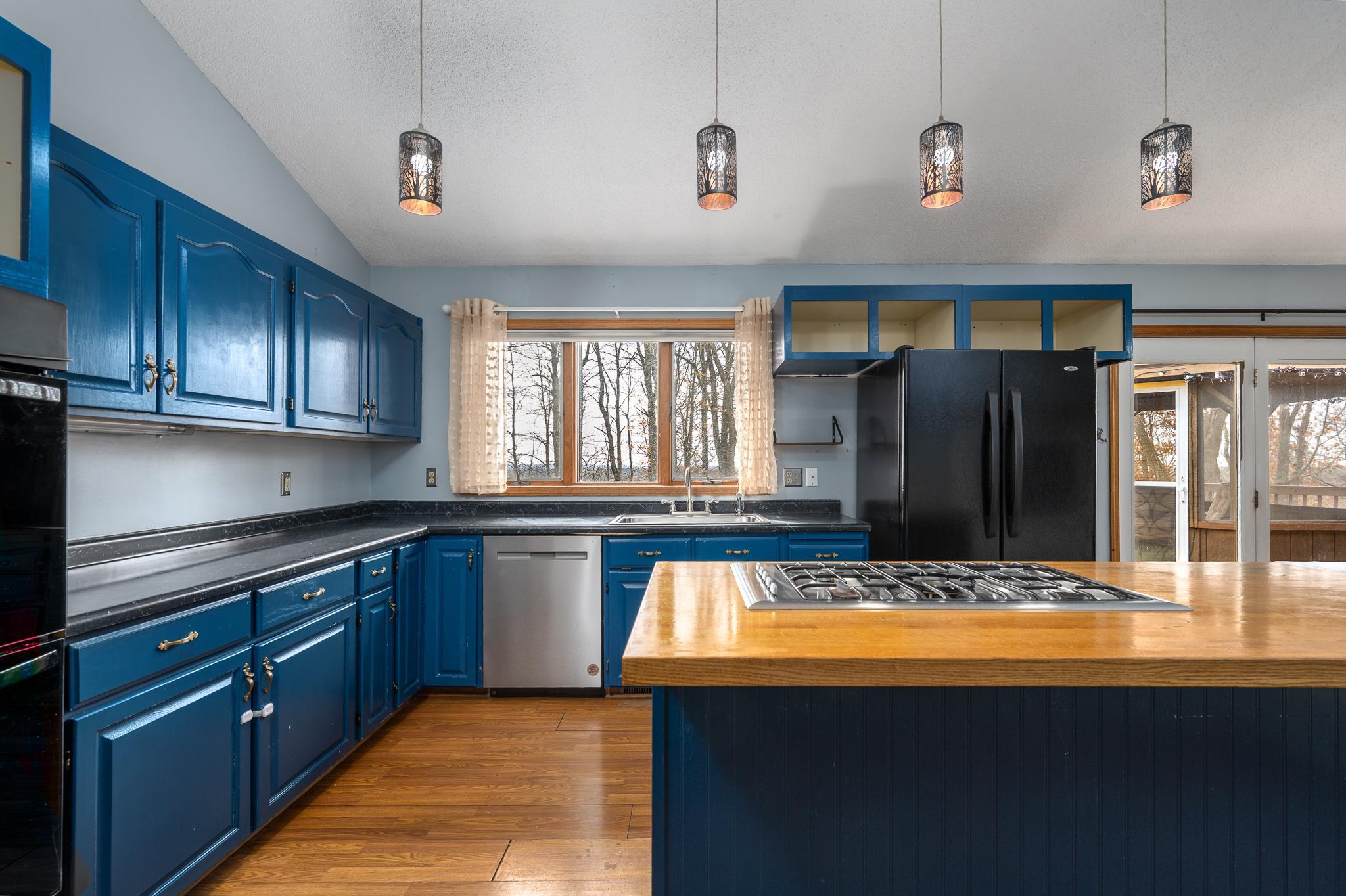 Kitchen - Spacious w/ island & kitchen window.