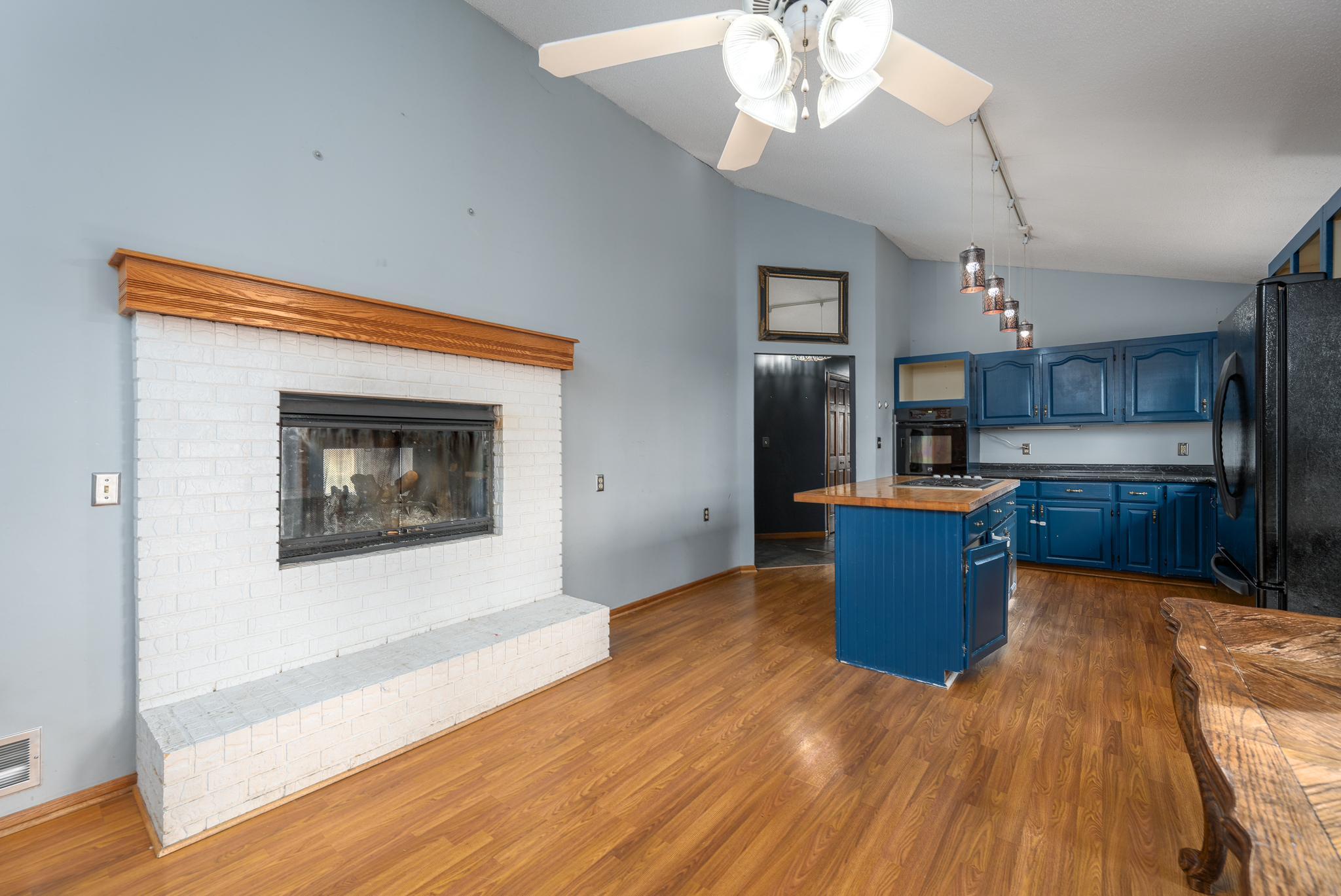 Wood burning fireplace is double sided. Shared with Living room