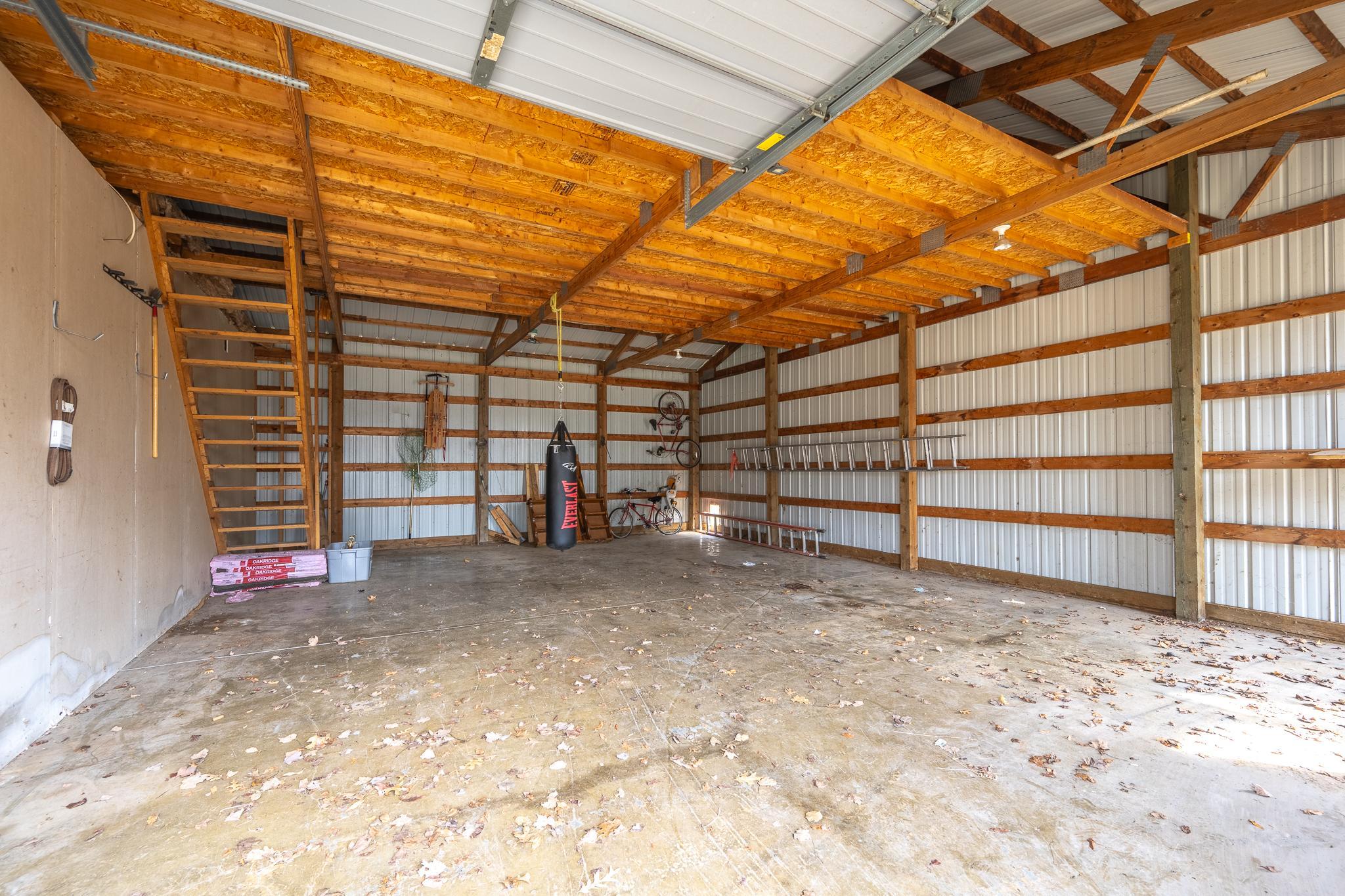 Pole shed side not insulated or heated, but overhead storage