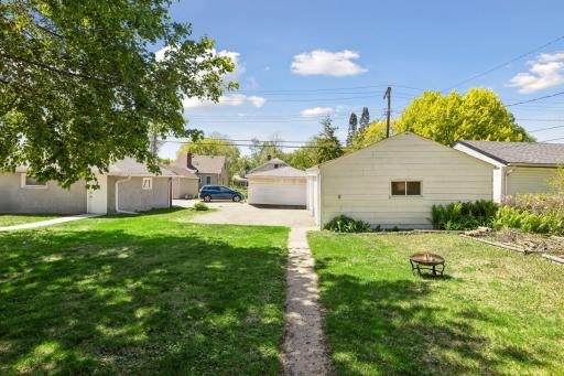 Large back yard to garage and parking pad