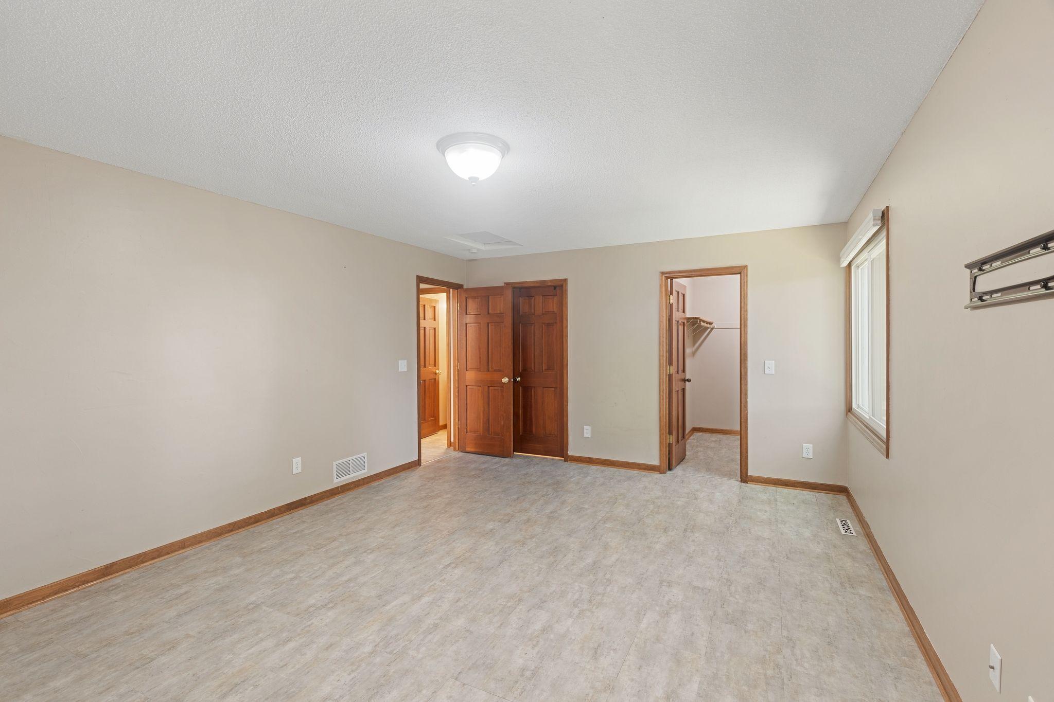 The primary bedroom features a large walk-in closet.