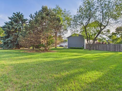 Huge corner lot with fenced in backyard.