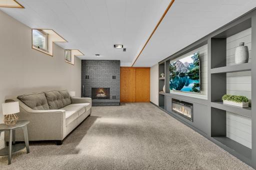 Fireplace becomes a focal point in this lower level living room.