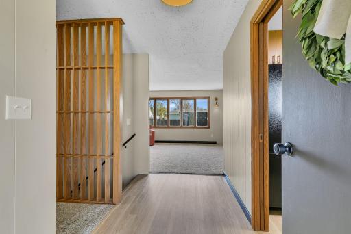 Step into this mid century modern home that has been updated to enhance its original design.