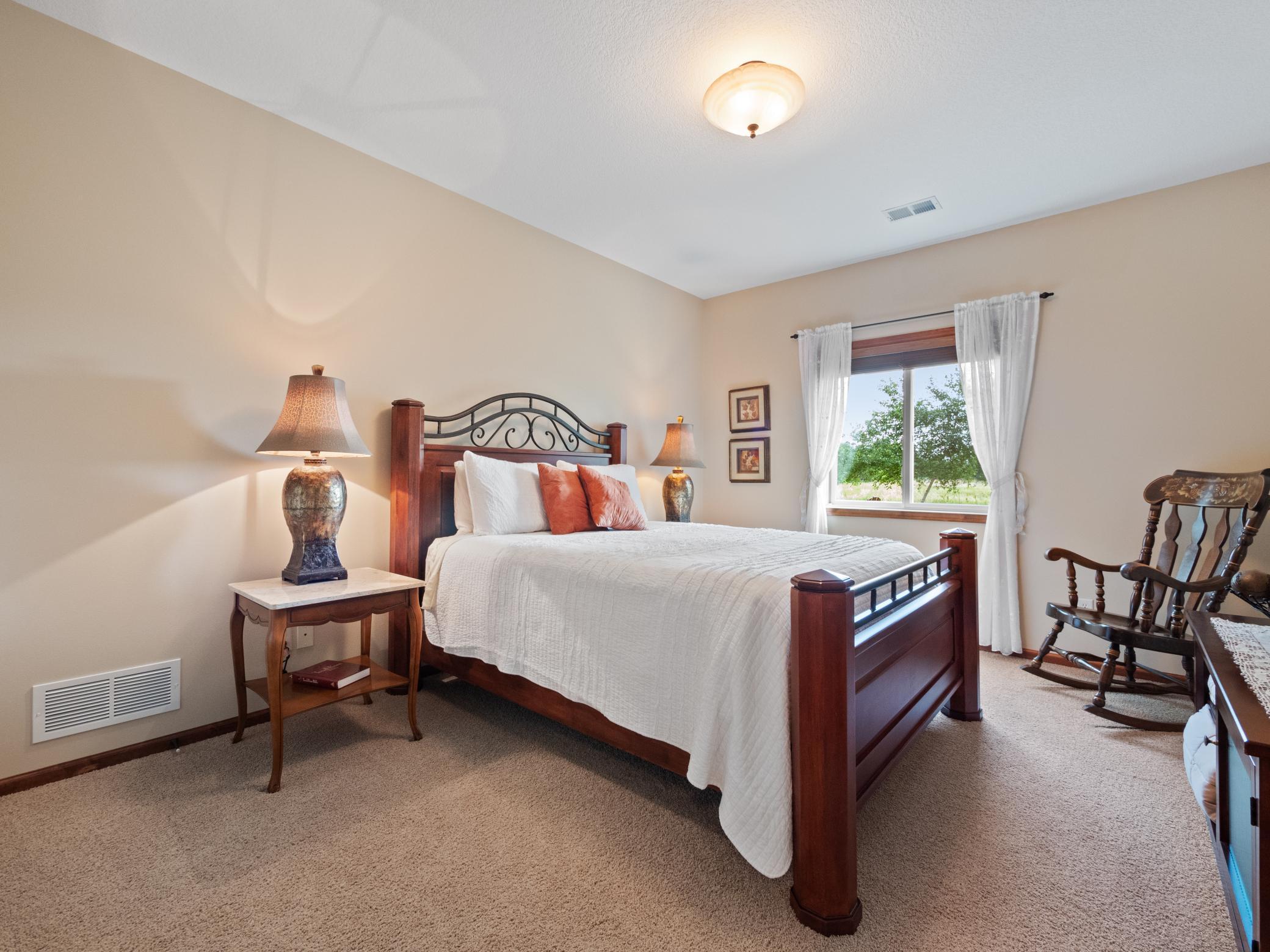 Second and third bedrooms are located on the lower level.