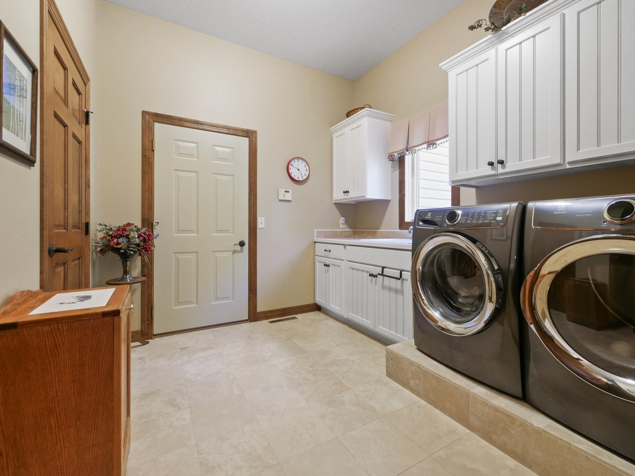 Laundry room with tons of storage.