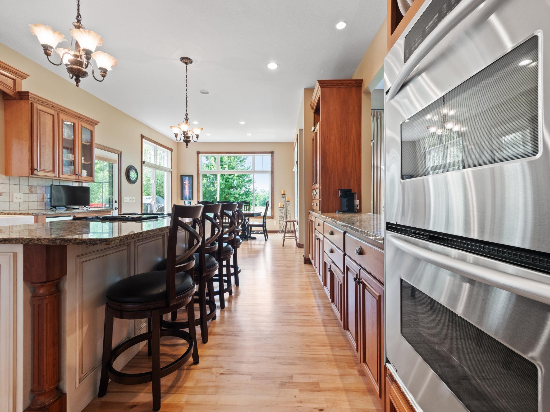 The island is perfect for casual seating and quick meals while the informal dining area can easily accommodate larger gatherings.