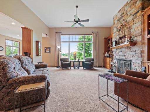 The oversized window allows for natural light to flood the main level while providing incredible backyard views and beyond.