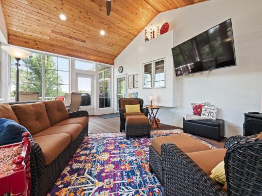 This newly built sunroom is surrounded by oversized windows creating an airy and BRIGHT living space!