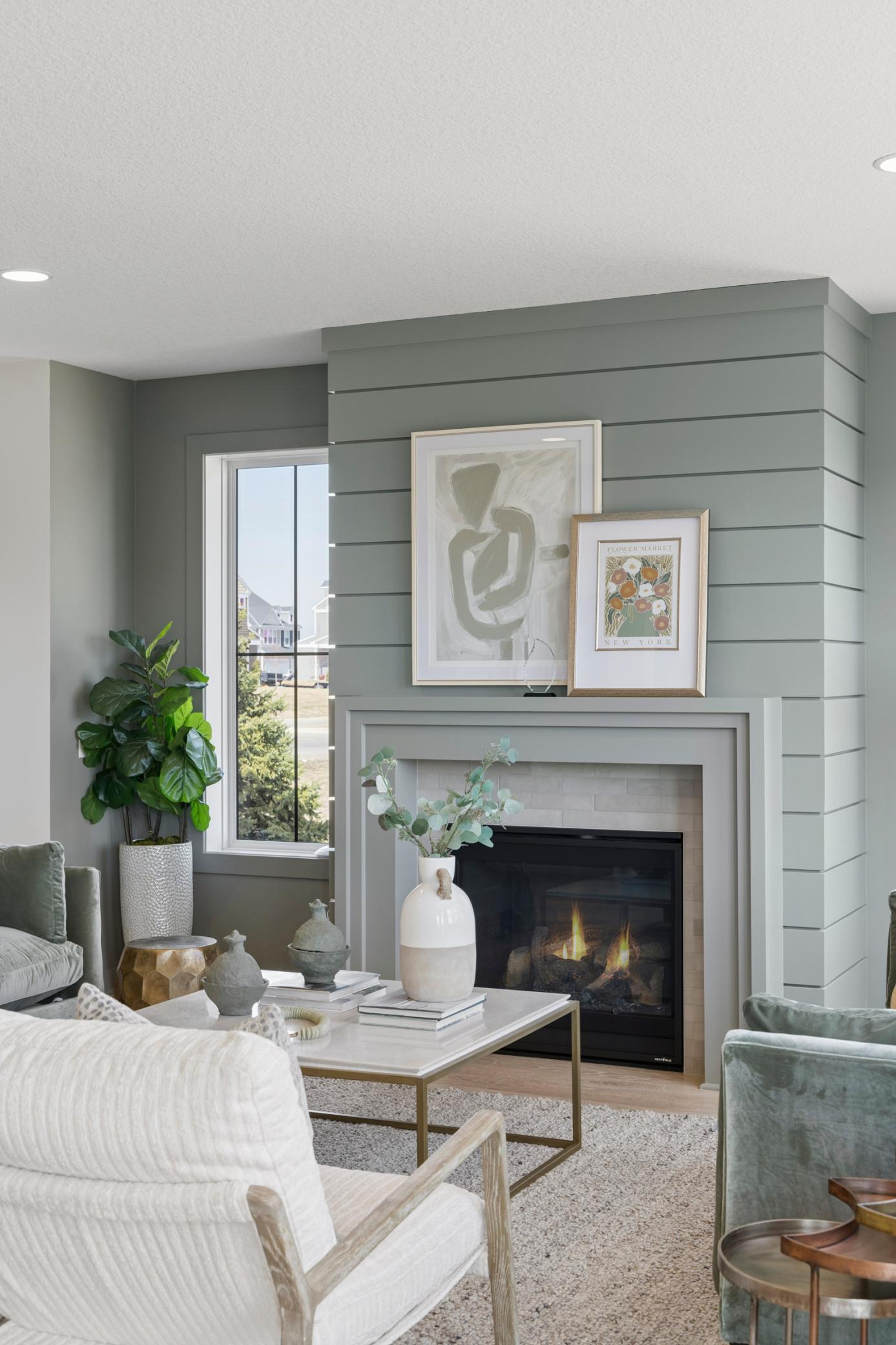 Gathering room features gas fireplace.