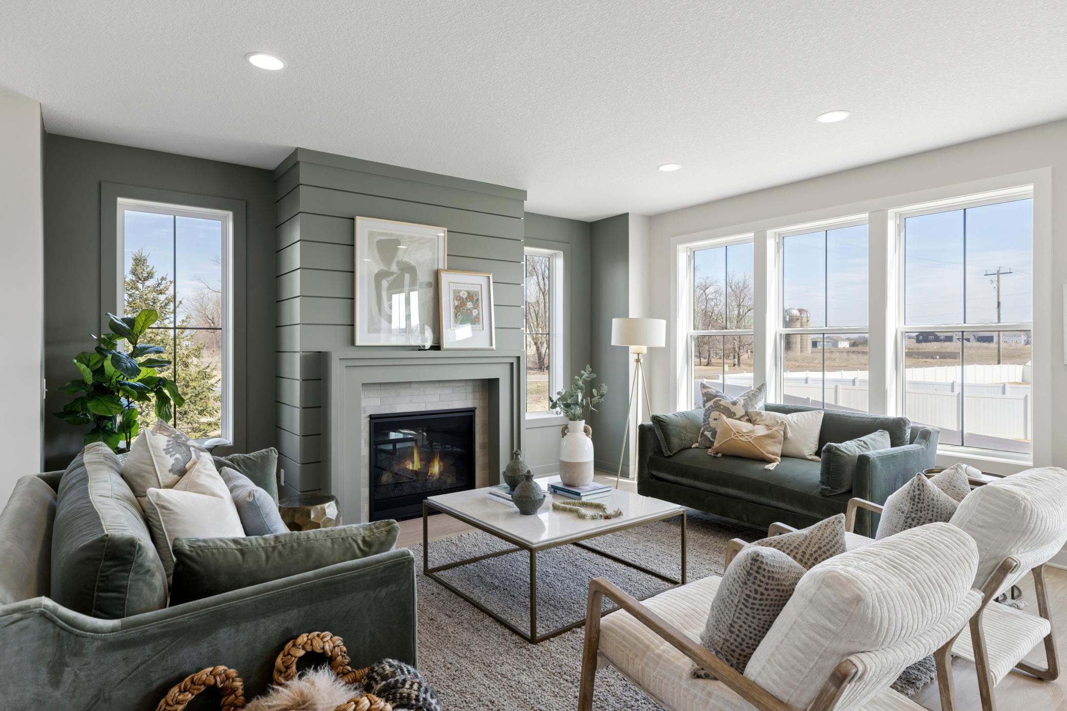 Stunning showcase model in popular Waypointe of Woodbury Neighborhood now available!