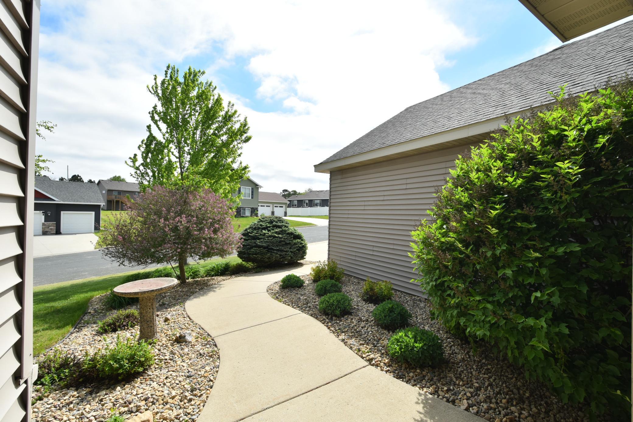 mature landscaping offers incredible curb appeal