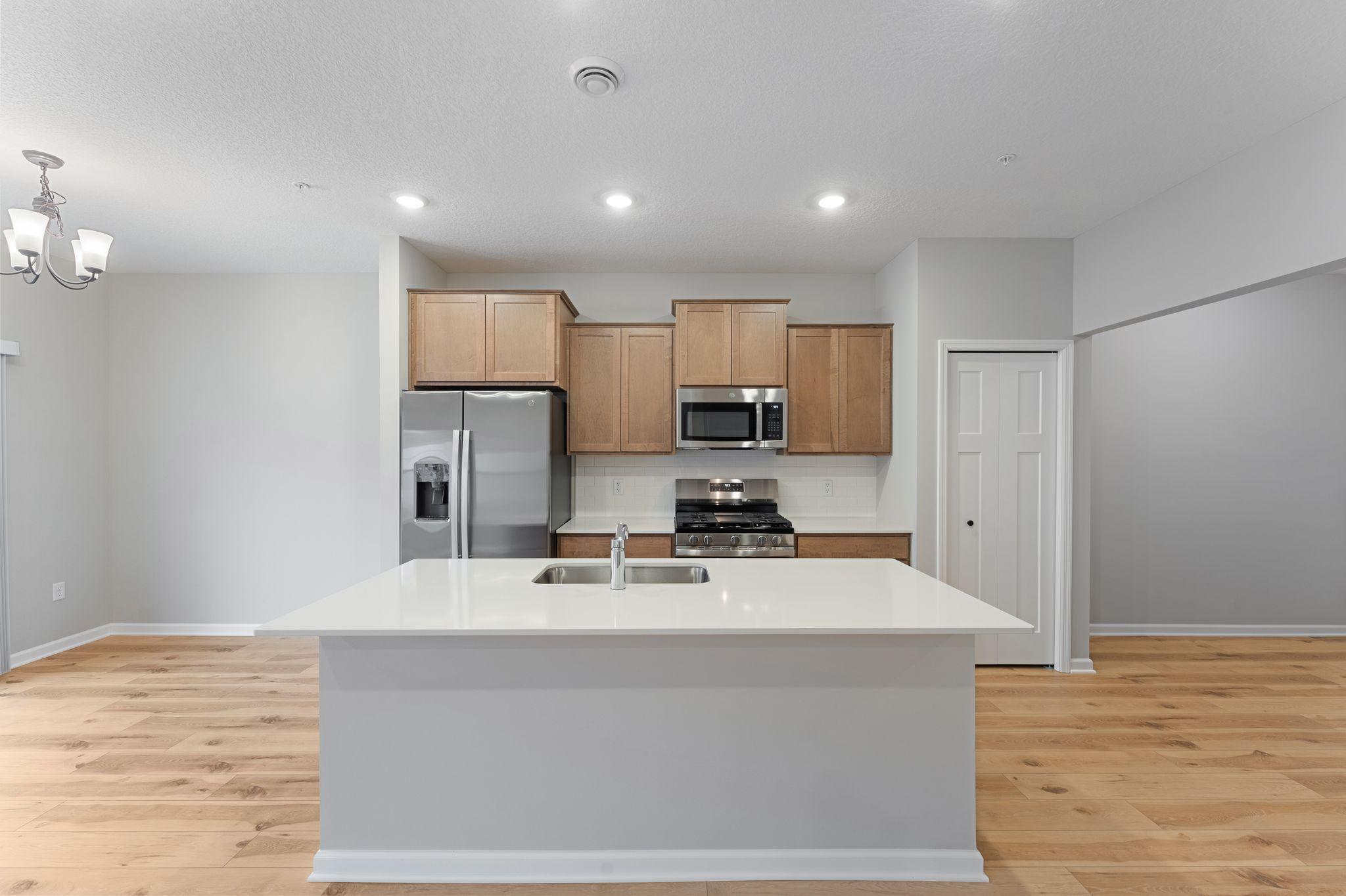 Warm, stained cabinets