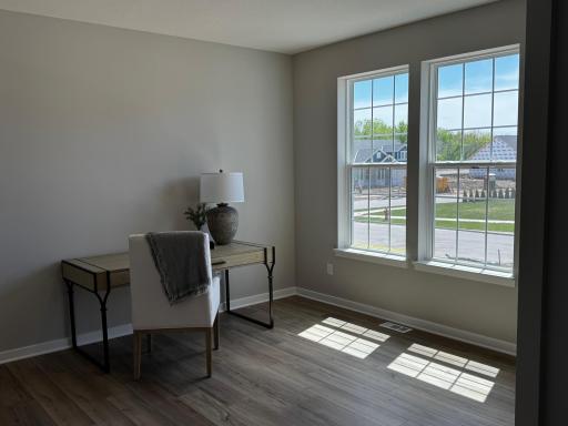 Model has been staged. Front flex room/dining room