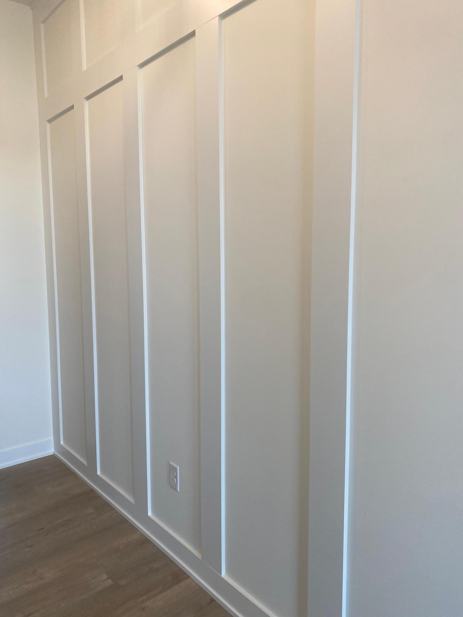Detailed custom moldings in the foyer add an elegant, extra touch of sophistication.