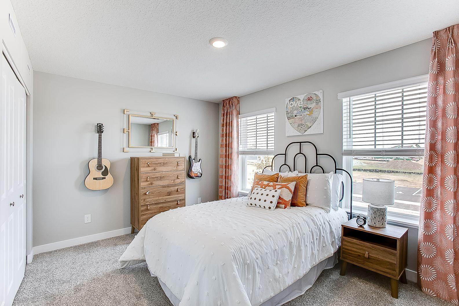 2nd of 4 large bedrooms, all on the upper level. *Model home, colors and finishes will vary.