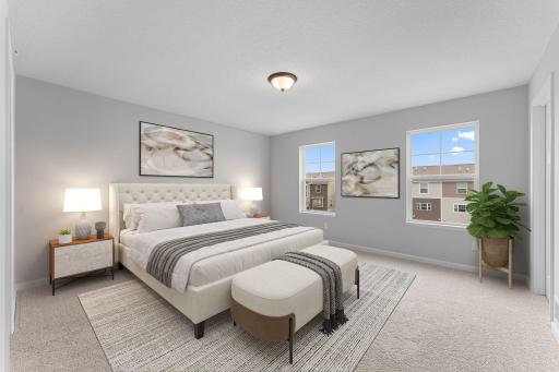 The owner's suite is a true oasis. The en-suite bath provides convenience and luxury and the 17x14 space can easily accommodate many furniture arrangements. Similar home shown, options can vary.