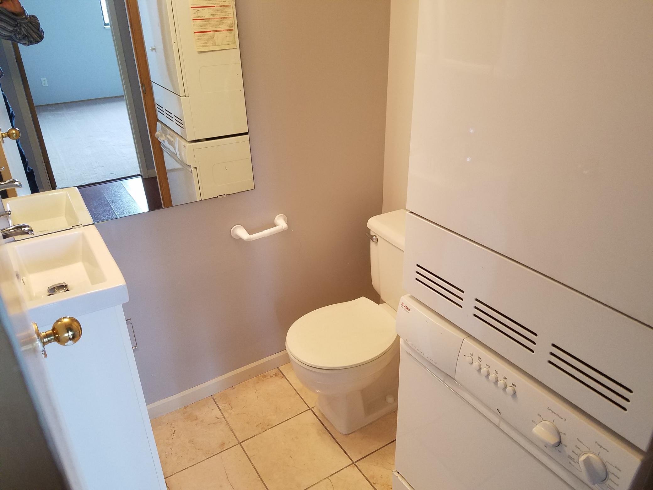 1/2 bath with washer and dryer