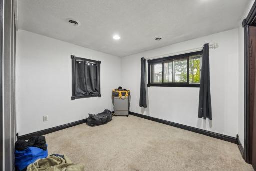 3rd bedroom off of den. Home is split up nicely to allow for bedroom in different areas as well as community spaces