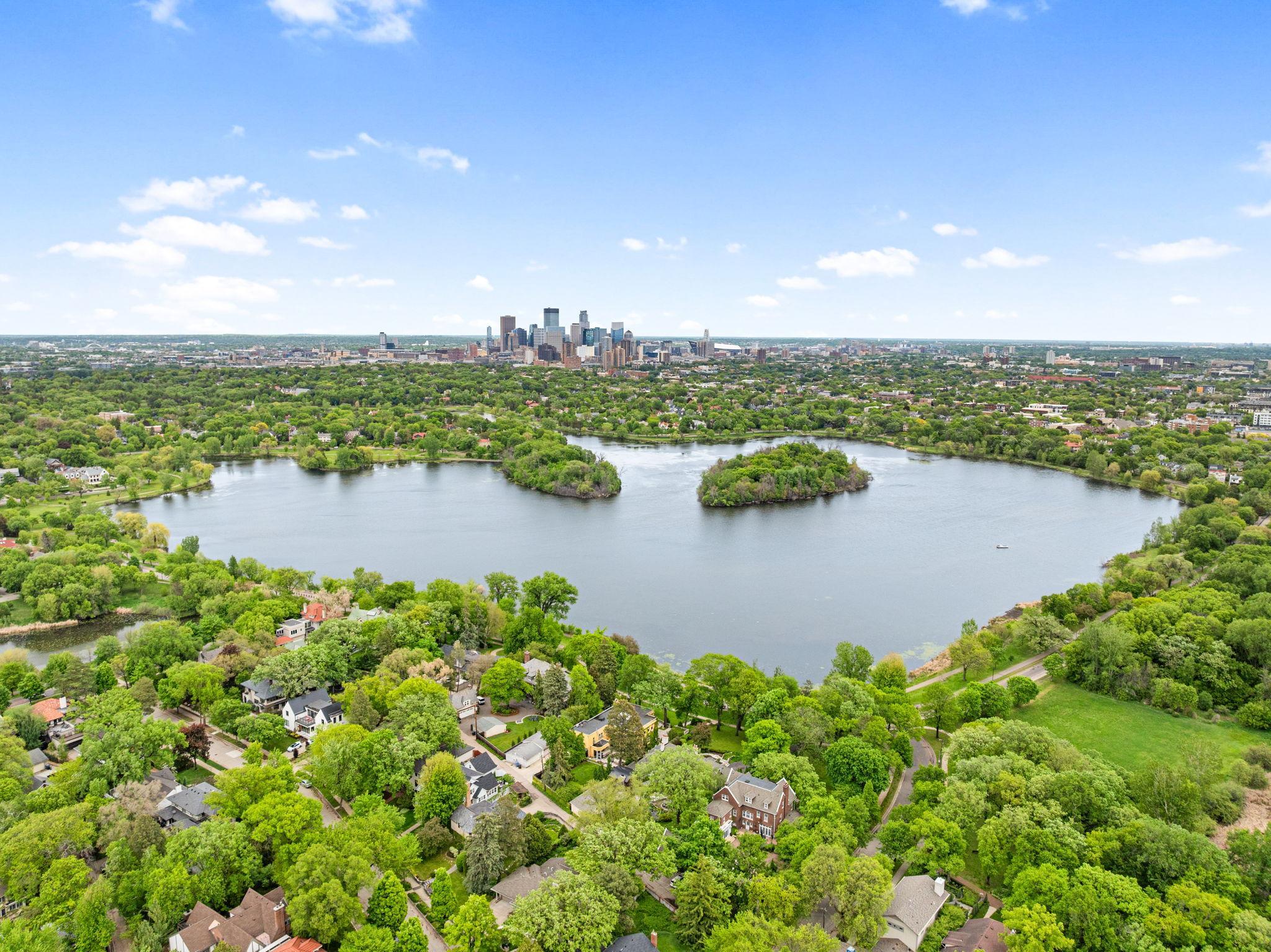 Incredible Calhoun Isles setting with sweeping views of the lakes, Minneapolis skyline, and surrounding tree-lined neighborhoods.