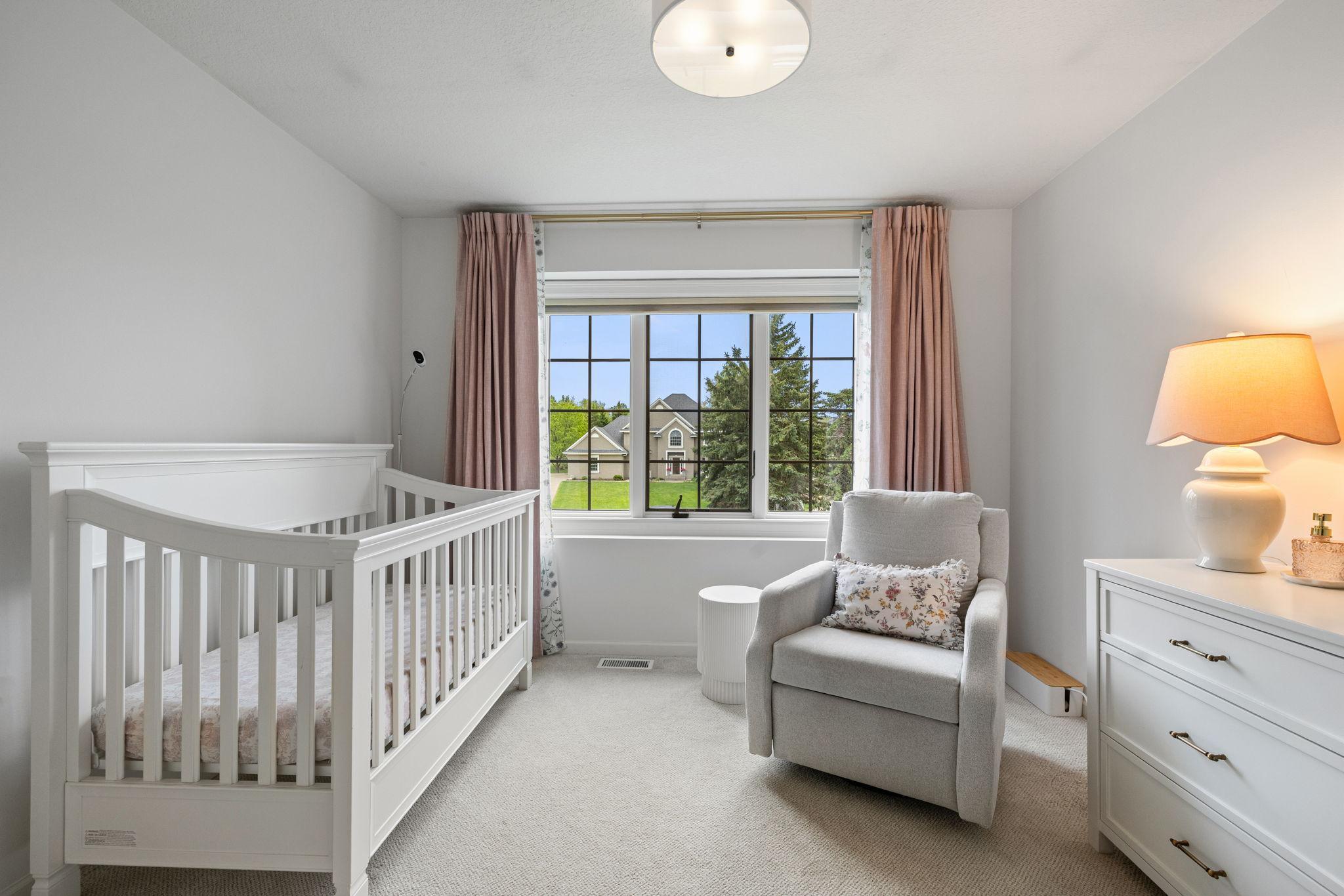 Upper-level bedroom with ensuite jack-and-jill bathroom