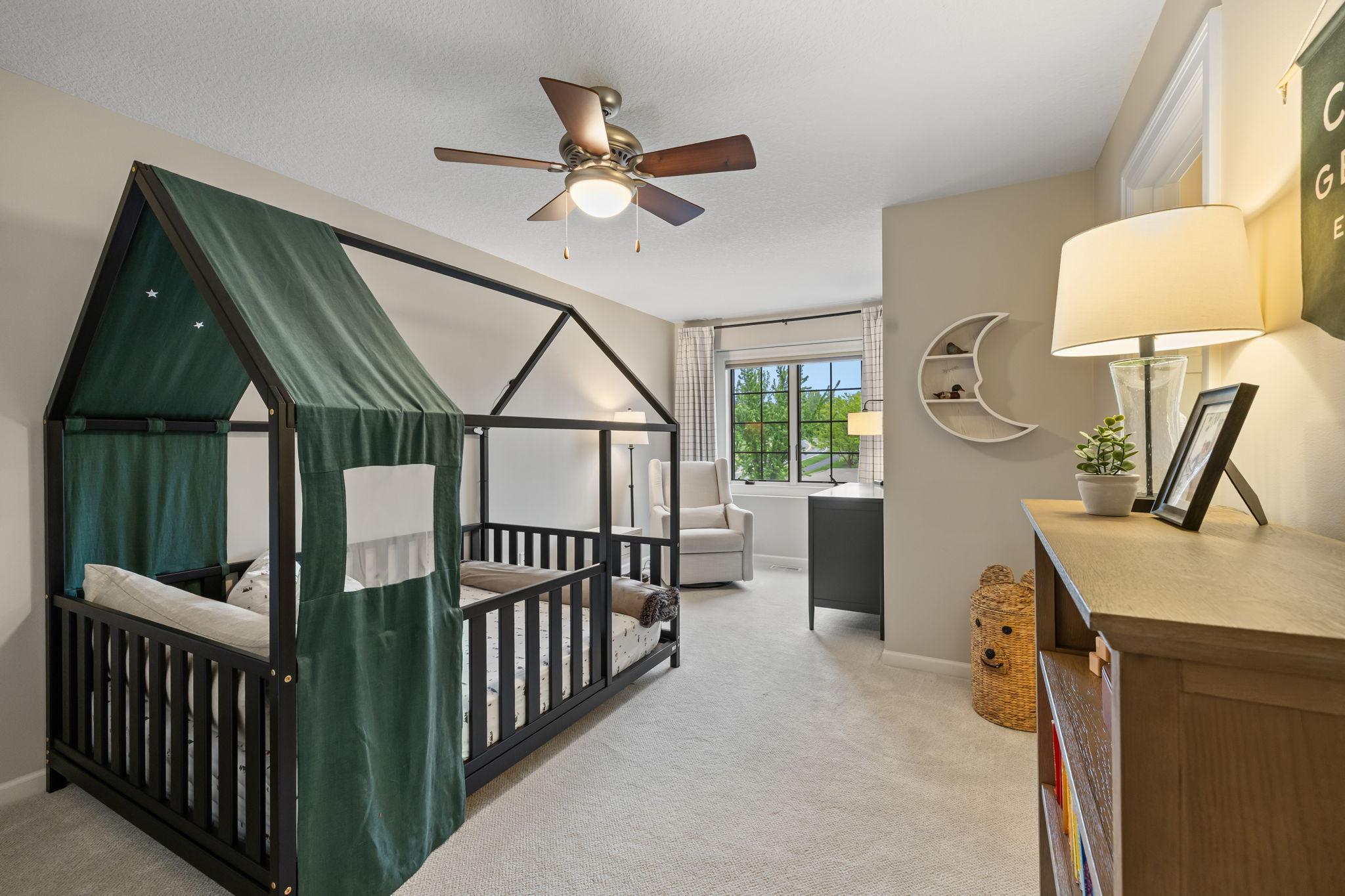 Upper-level bedroom with ensuite jack-and-jill bathroom