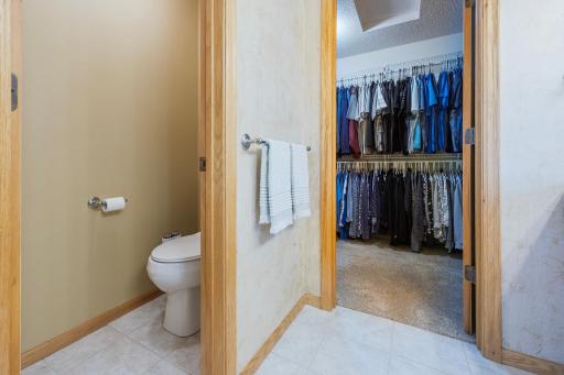 Private toilet with pocket doors in primary bath!