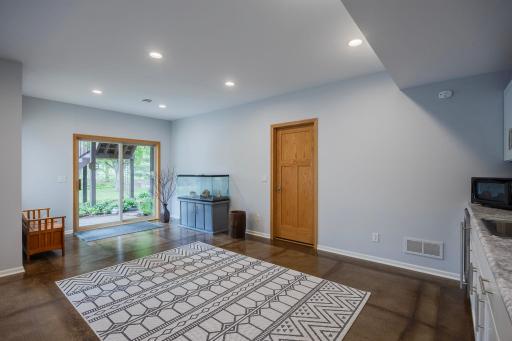 Sliding glass doors walk out into the backyard!