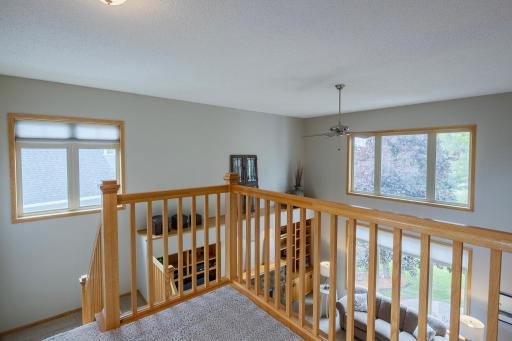 Upper level landing overlooks living room!