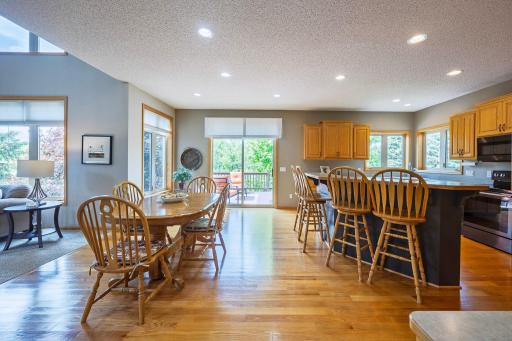 Dining room with breakfast bar at large kitchen island!