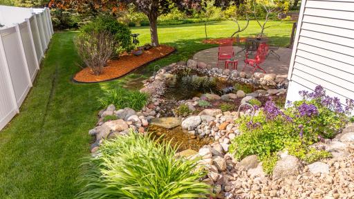 Cascading Water fall down the side of the house into the Koi pond!