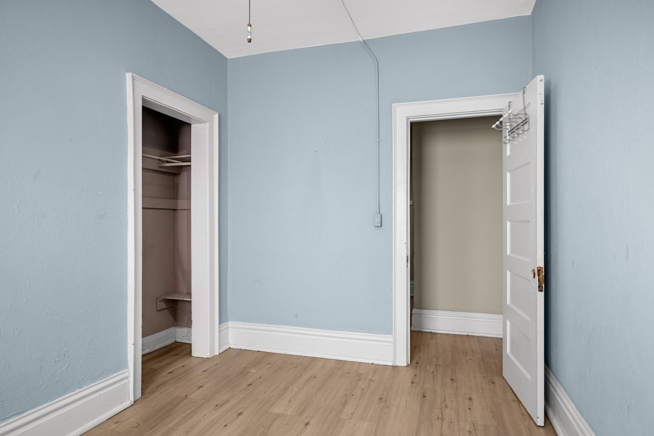 Bright bedroom with ample closet space