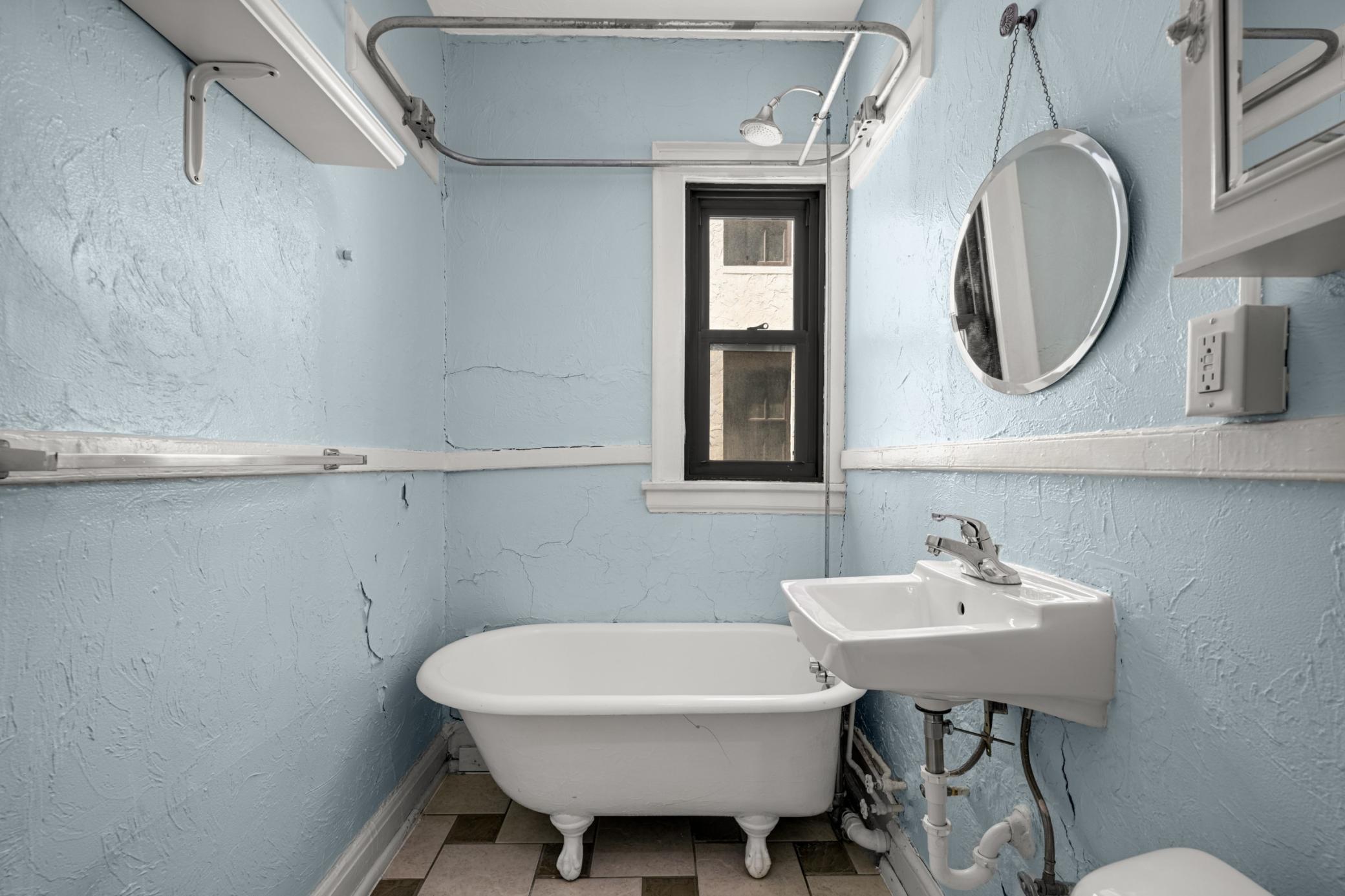 Bathroom potential includes classic clawfoot tub