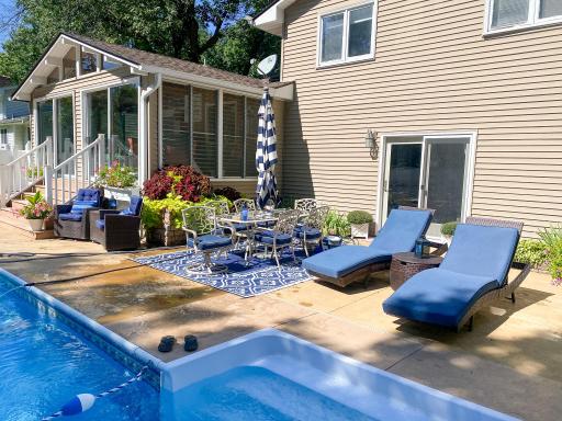 Three-season porch and additional patio in the background. This is what Plymouth summers look like.