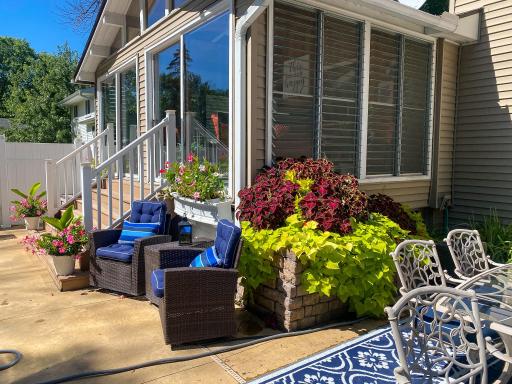 Established landscaping with perennial beds, retaining wall, and mature plantings â the underground sprinkler system keeps everything looking its best all season.
