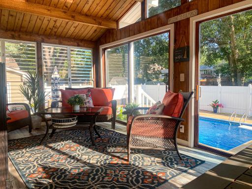 The porch comfortably seats a full outdoor living set â guests never want to leave. Perfect from May through October for morning coffee or evening conversations poolside.