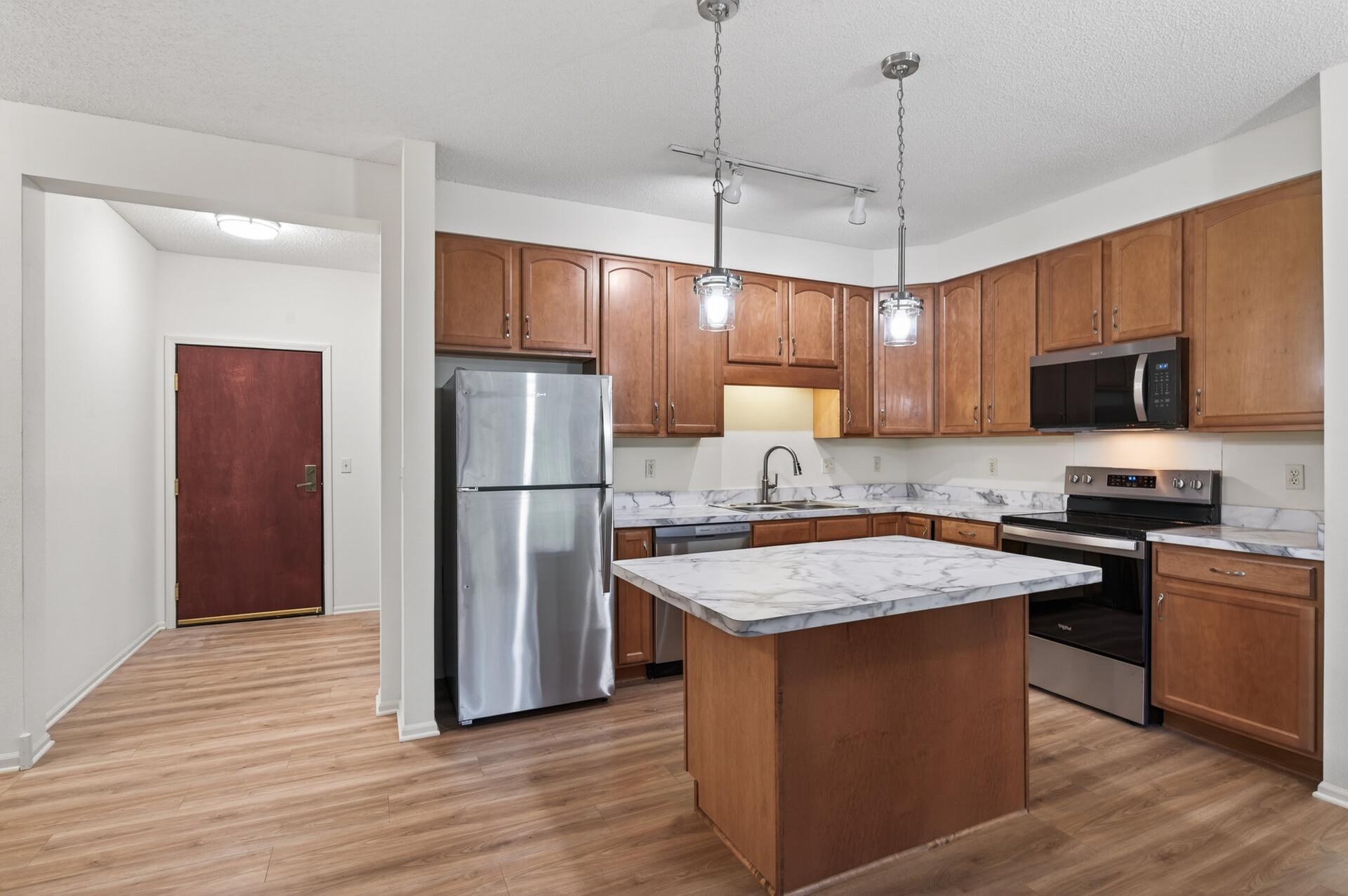 Brand new stainless steel appliances, new countertops and new flooring!