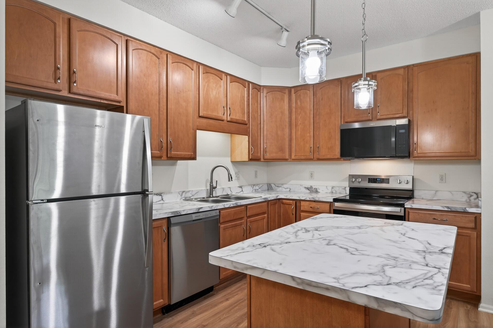 Brand new stainless steel appliances, new countertops and new flooring!