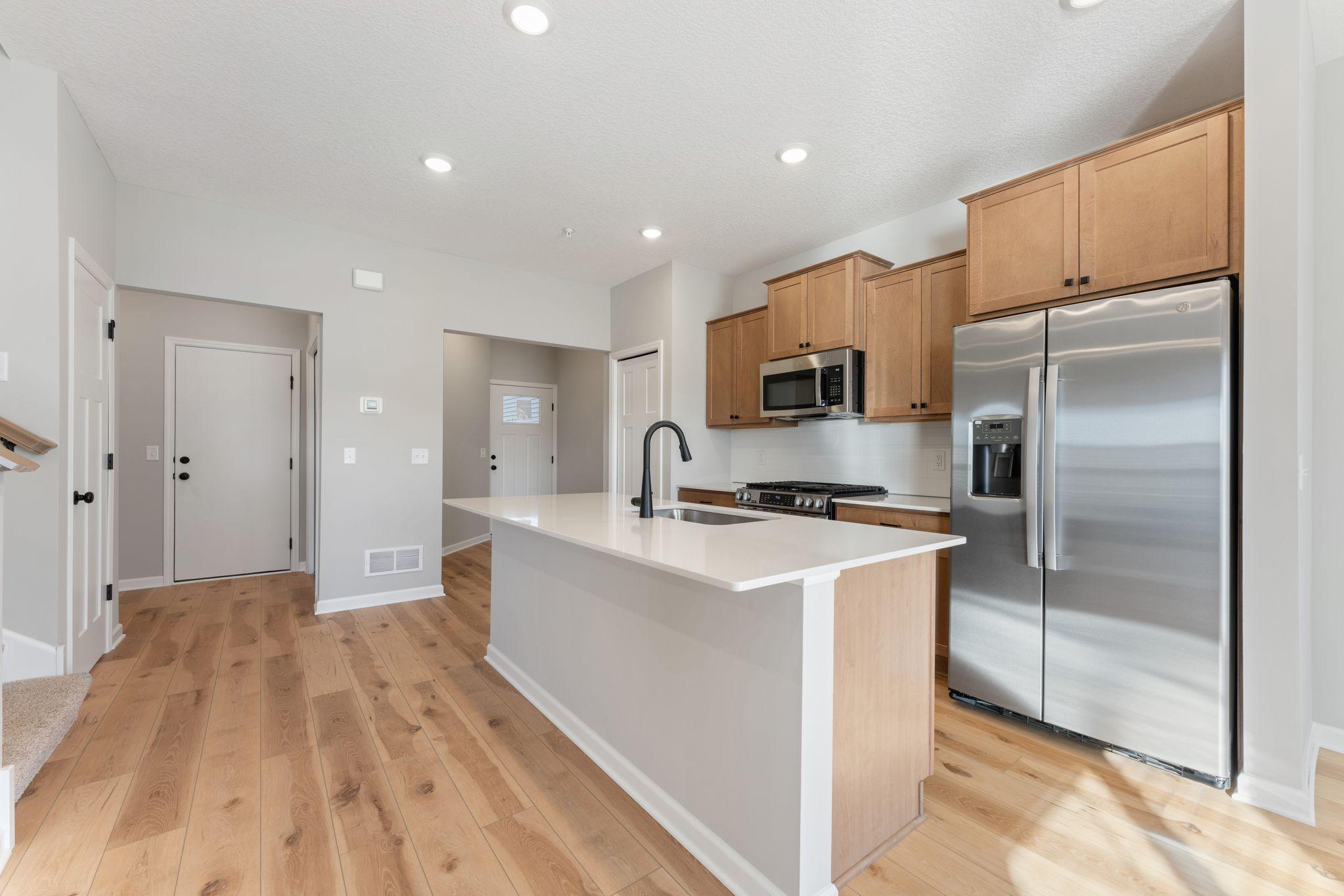 Warm, stained cabinets