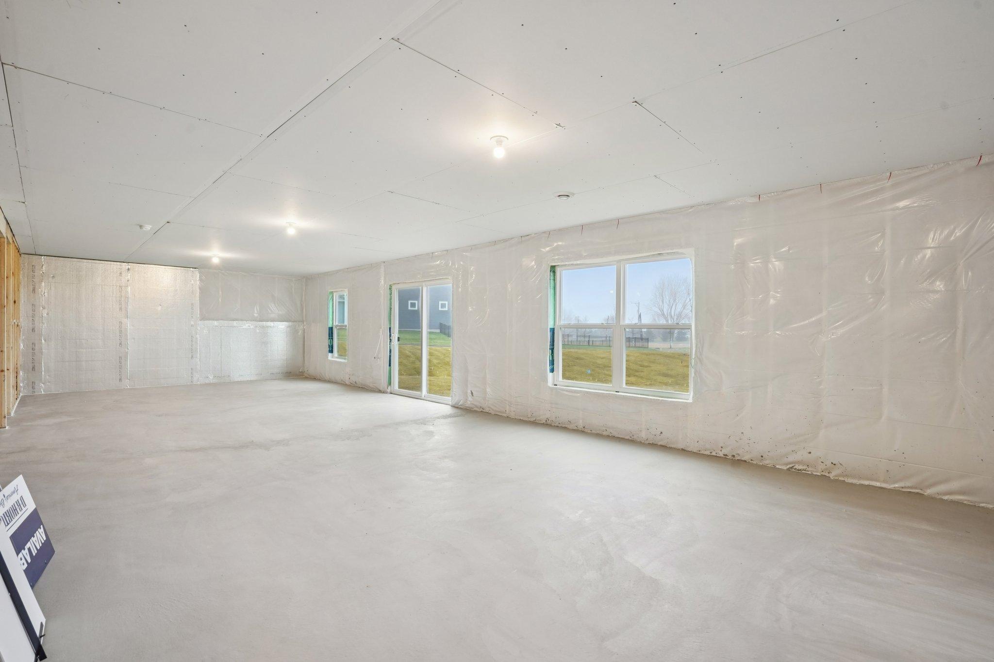 The unfinished walkout basement is a perfect place to make your own how you want.