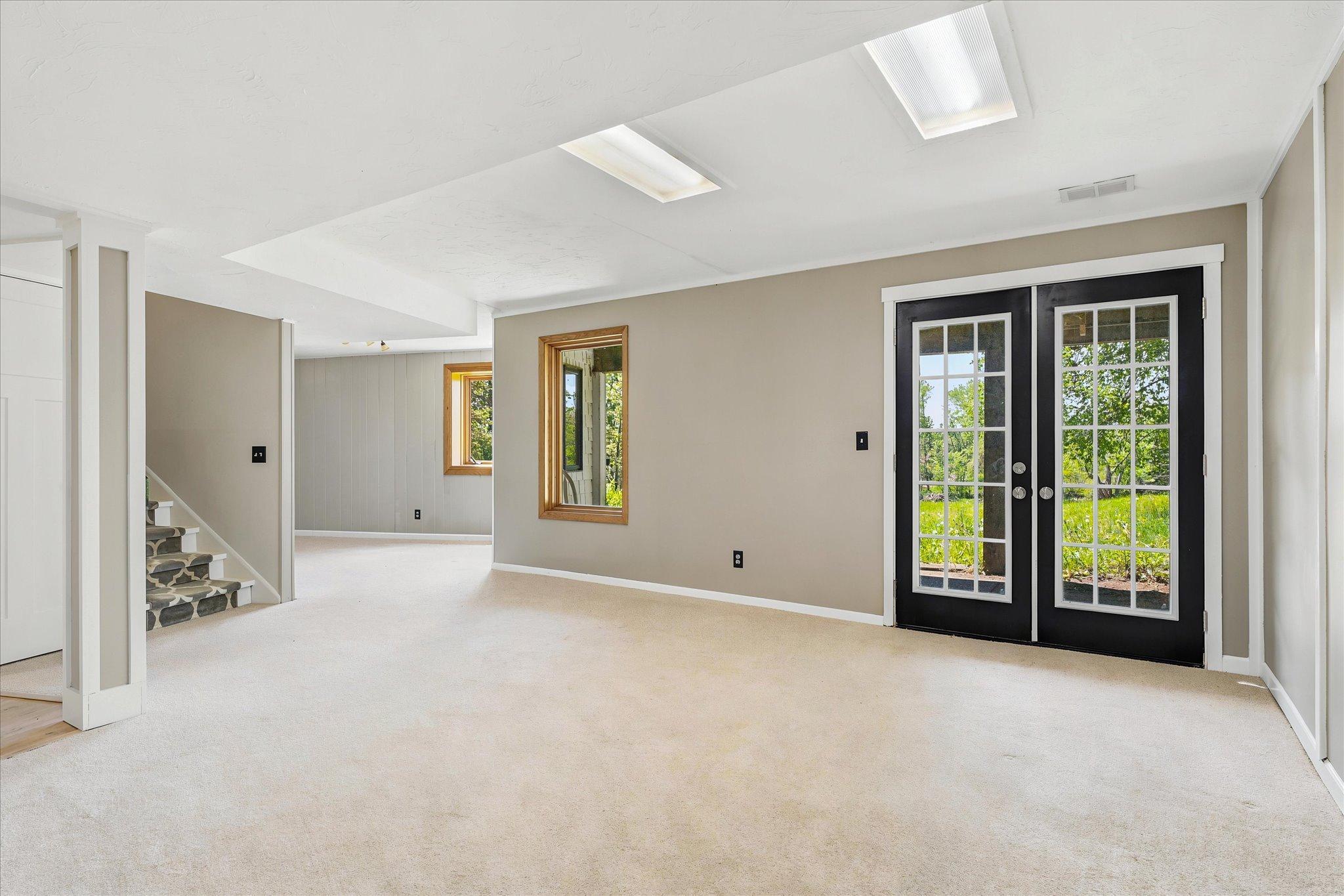 French doors to covered patio and private views.